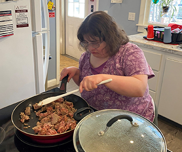 Woman cooking at home