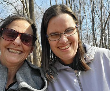 Women outdoors smiling